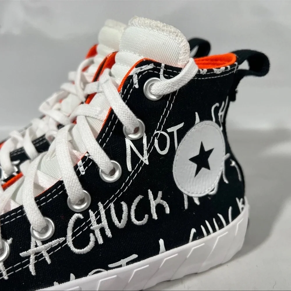 Converse Kids Black and White Sneakers with Orange Highlights